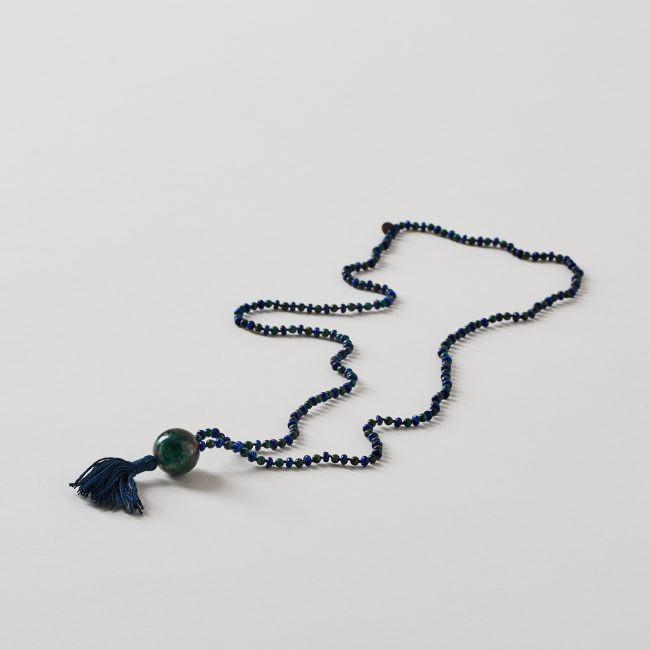 mala with blue and green beads and blue tassel