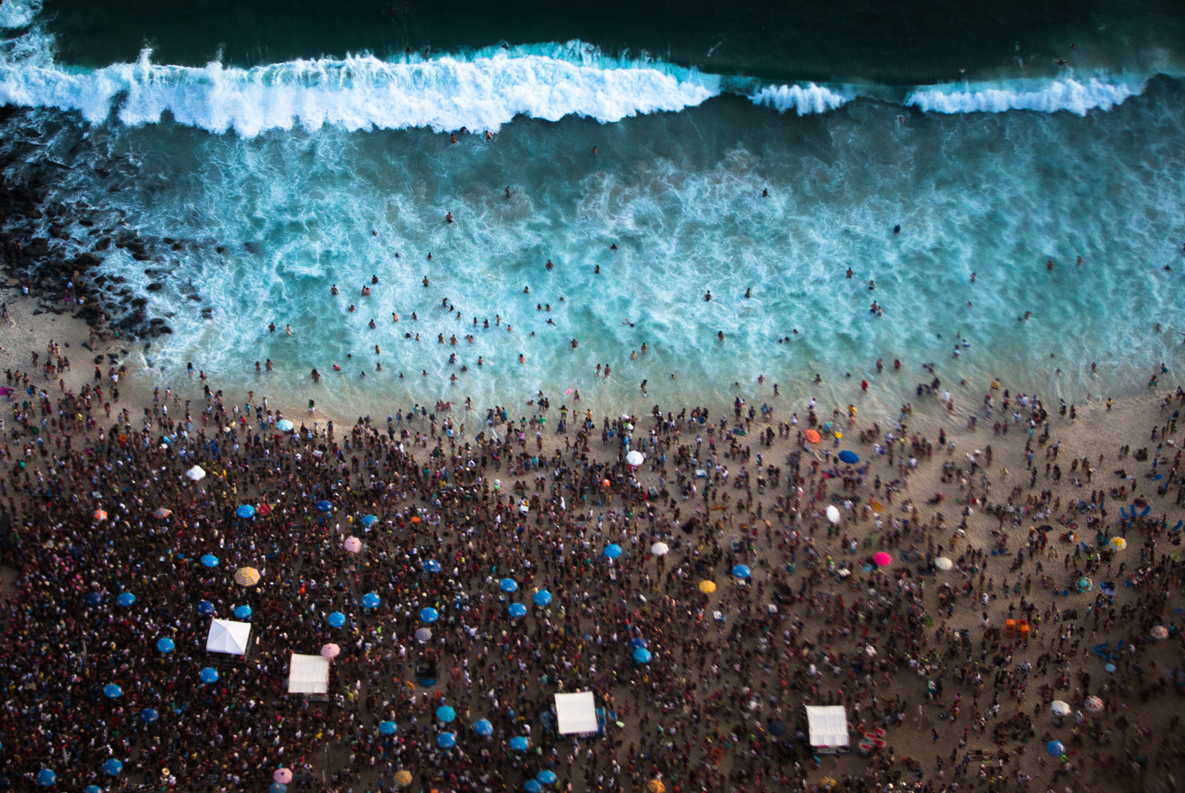 large crowd of people at beach