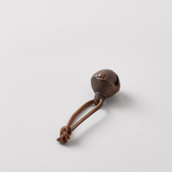 brass bell with leather hanger